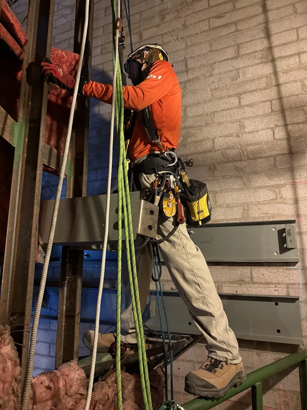 ARS technician working on industrial steelwork during shutdown-related access work